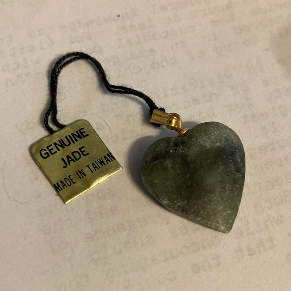 Jade heart pendant with tag